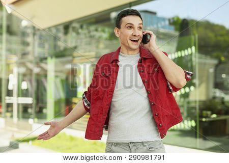Surprised Handsome Man Asking About New Price For Product