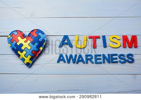 World Autism Awareness Day, Mental Health Care Concept With Puzzle Or Jigsaw Pattern On Heart