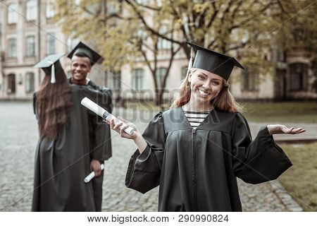 Charming Blonde Girl Looking Straight At Camera