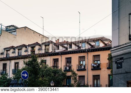 Madrid, Spain - 26 September 2020: Old Residential Building With Traditional Attics In Malasana Quar