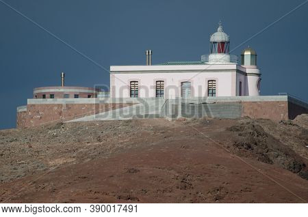 Arinaga Lighthouse In The Arinaga Mountain Natural Monument.