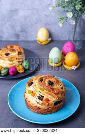 Craffin (cruffin) With Raisins, Nuts And Candied Fruits. Easter Bread Kulich And Painted Eggs. Easte