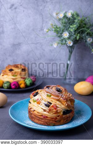 Craffin (cruffin) With Raisins, Nuts And Candied Fruits. Easter Bread Kulich And Painted Eggs. Easte