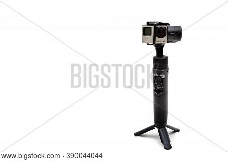 London, United Kingdom, 21st September 2020:- An Isteady Gimbal With A Gopro Hero4 Camera Isolated O