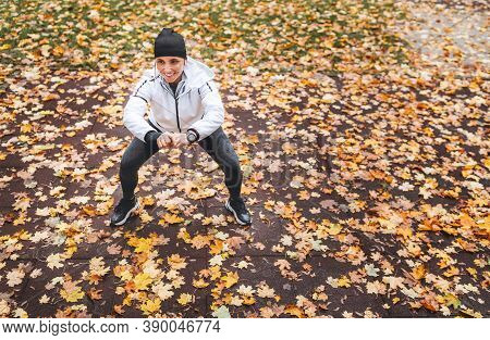 Young Fit Athletic Woman Wears Modern Running Clothes Standing On The Footway Before Jogging In The 