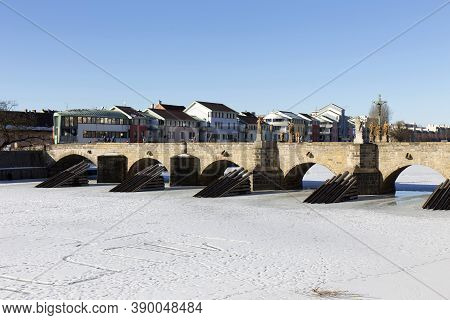 Colorful Royal Snowy Medieval Town Pisek Above The Frozen River Otava, Czech Republic