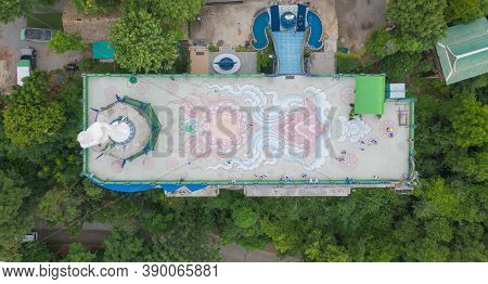 Aerial View Of Big White Buddha In Wat Khao Phra Kru Temple, Si Racha District, Chonburi, Thailand.