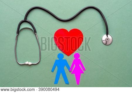 Family Paper Cut Out With Red Heart And Stethoscope, Heart Health, Family Health Insurance Concept.