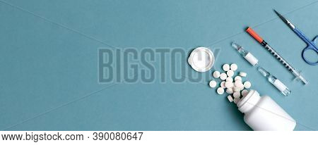 Pills, Ampoule, Syringes, Capsules, Stethoscope On The Blue Doctor S Table. Copy Space. Place For Te