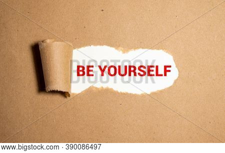 Torn Paper Revealing Words Be Yourself, Idea For How To Love Yourself, Investing In Knowledge.