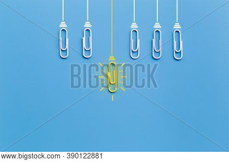 Great Ideas Concept With Paperclip,thinking,creativity,light Bulb On Blue Background,new Ideas Conce