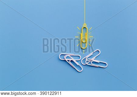 Great Ideas Concept With Paperclip,thinking,creativity,light Bulb On Blue Background,new Ideas Conce