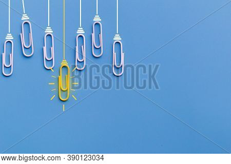 Great Ideas Concept With Paperclip,thinking,creativity,light Bulb On Blue Background,new Ideas Conce