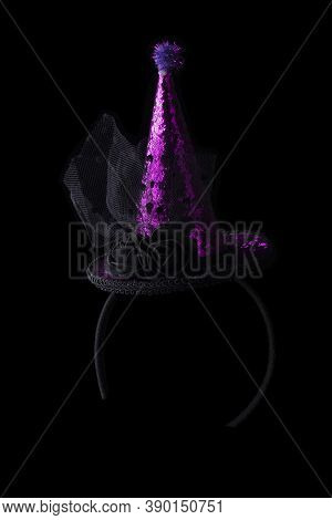 Halloween Hat Shiny On Black Background.bright Cap On The Hoop.