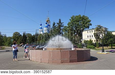 Tambov, Russia. September 5, 2020 People At The Fountain On The Embankment Next To The Kazan Monaste