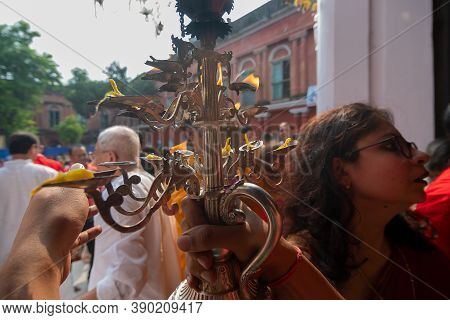 Kolkata, West Bengal, India - 6th October 2019 : Hindu Female And Male Devotees Praying To Goddess D