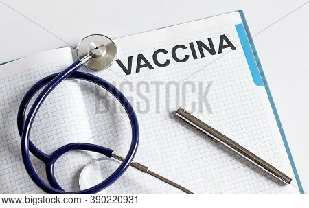 Paper With Text Vaccina On A Table With Stethoscope