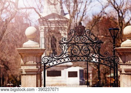 Gates Of The Park And Civil War Monument View In Cambridge Massachusetts, Usa