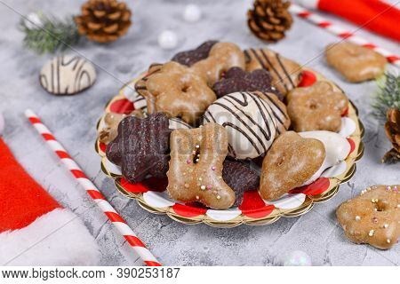 Traditional German Gingerbread Cookies With Sugar And Brown And White Chocolate Glazing In Heart And