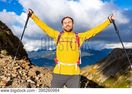 Snow White Smiling Man With Braces In Mountains . Concept Of Teeth Care Far From Home