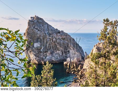 Coastal Seascape Landscape. Rock Diva, The Black Sea Coast Near Yalta, Crimea. People Walk On The Su