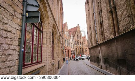 Bruges, Belgium - May 12, 2018: View To Empty Street Steenstraat Quarter