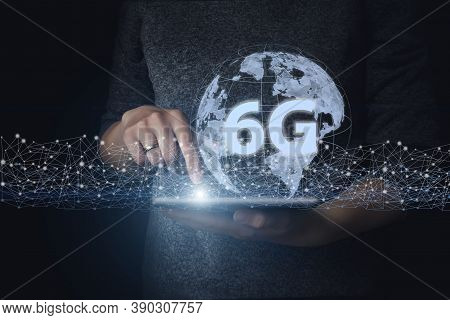 Hand Hold Tablet With Gologram Eart And 6g. Creative Connection Background, A New Generation Network