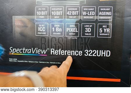 Paris, France - Apr 11, 2018: Male Hand Pov Pointing On The Cardboard Package Of Nec Spectraview Ref
