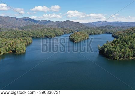 Aerial View Of Lake Santeetlah, North Carolina And Surrounding National Forests In Autumn Color.