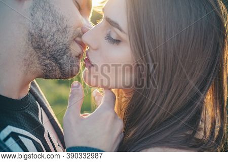 Sensual Kiss. Close-up Of Beautiful Passionate Couple Kissing. Sexy Couple In Love. Intimate Relatio