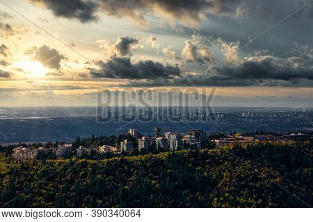 Aerial View Of Burnaby Mountain During A Vibrant Sunrise. Taken In Greater Vancouver, British Columb