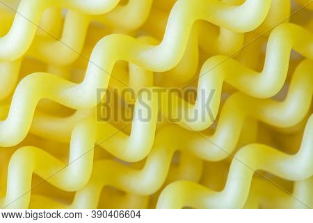 Close Up Macro Of Uncooked Spiral Fusili Italian Pasta
