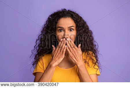 Omg. Shocked Brunette Woman Covering Mouth With Hands, Looking At Camera With Astonishment, Emotiona