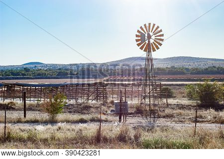 Vineyards, Drying Racks And A Windmill Next To The Orange River Between Groblershoop And Upington