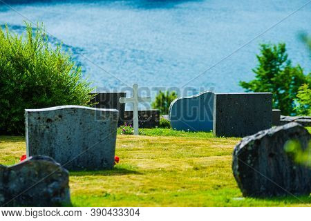 Norwegian Churchyard In Nes Village At Fjord Lusterfjord, Vestland County, Norway.