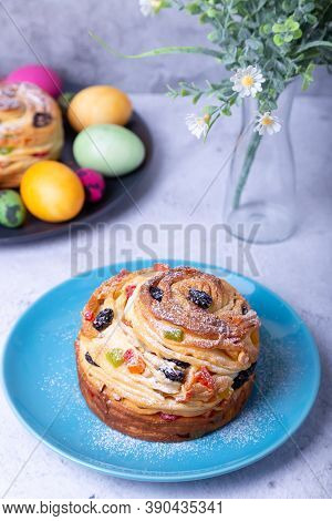 Craffin (cruffin) With Raisins, Nuts And Candied Fruits. Easter Bread Kulich And Painted Eggs. Easte