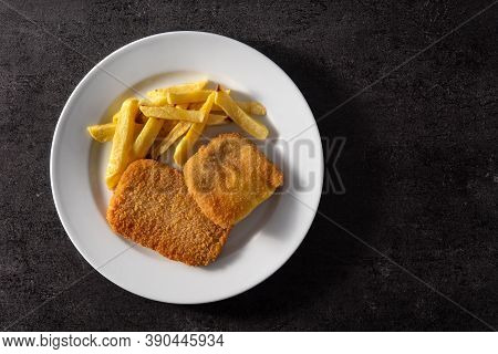 San Jacobo Steak Filled With Cheese And Ham On Black Stone.top View. Copy Space