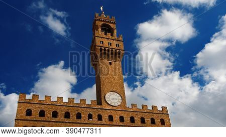 Palazzo Vecchio (old Palace) Clocktower Among Clouds, The Beautiful Florence Town Hall Erected In Th