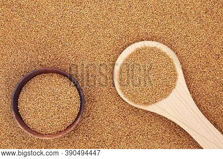 Camelina seed high in omega 3 & antioxidants, is beneficial for the heart, arthritis, hair dandruff, moisturizing skin, boosts the immune system and is an anti inflammatory. Top view, flat lay.