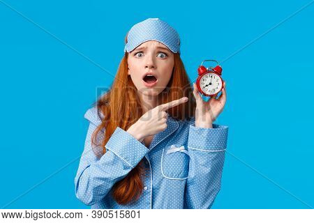 Upset And Disappointed Gloomy Redhead Woman In Nightwear. Sleep Mask, Arguing Boyfriend Didnt Set Up