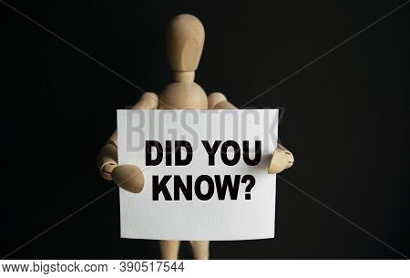 The Wooden Man Holds A White Sign With The Text Did You Know In His Hands. The Content Of The Letter