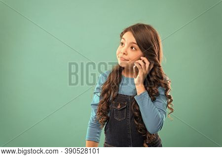Conversation Concept. Little Girl Having Phone Talk. Modern Life Communication. Kid Shopping Online.