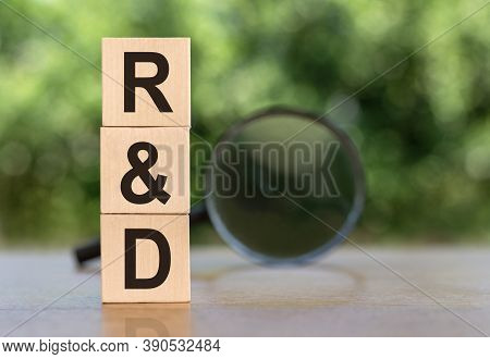 R And D Word Written On Wooden Blocks. Sales, Business Concept