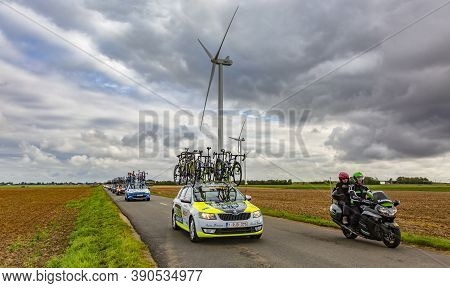 Le Gault-saint-denis, France - October 08, 2017: Row Of Technical Vehicles Driving On A Road In The 