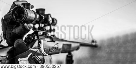 Hunting Period. Male With A Gun. Close Up. Hunter With Hunting Gun And Hunting Form To Hunt. Hunter 