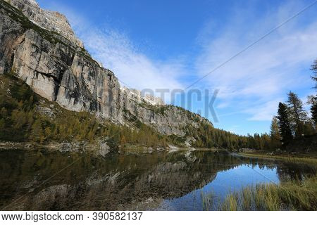 Autumn In The Dolomites, View Of Federa Lake Surrounded By Mountains. High Quality Photo