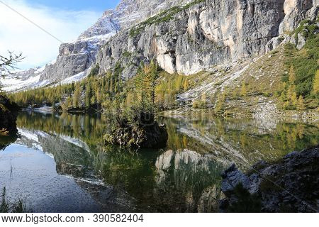 Autumn In The Dolomites, View Of Federa Lake Surrounded By Mountains. High Quality Photo