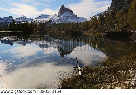 Autumn In The Dolomites, View Of Federa Lake Surrounded By Mountains. High Quality Photo