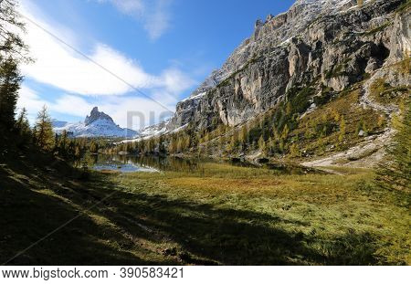 Autumn In The Dolomites, View Of Federa Lake Surrounded By Mountains. High Quality Photo