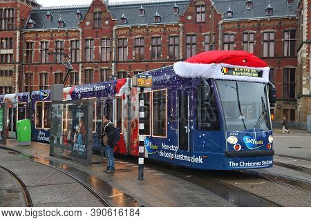 Amsterdam, Netherlands - December 6, 2017: People Ride The Gvb Electric Tram (combino Model Made By 